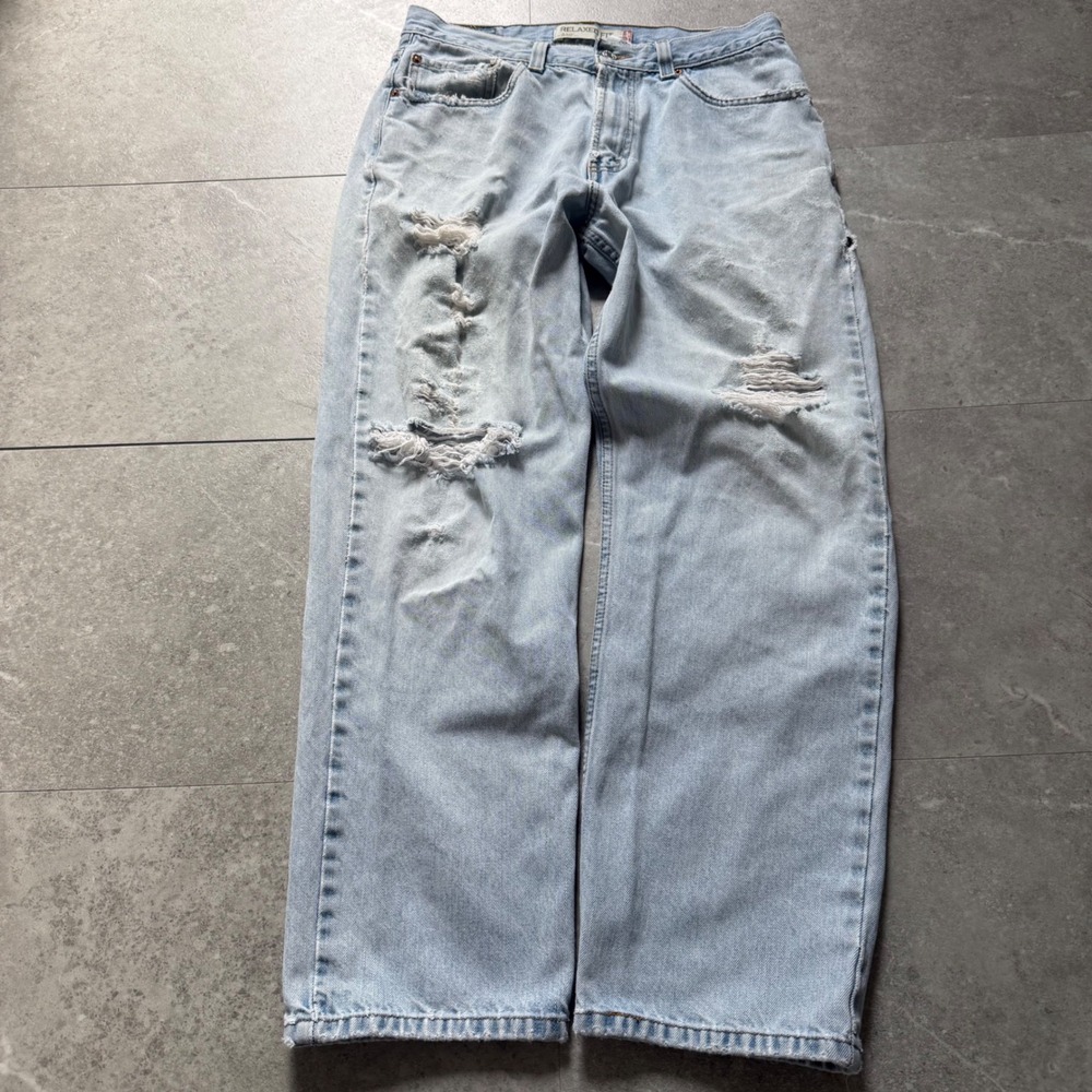 Vintage Levi's 550 Relaxed Fit Distressed Light Wash Jeans